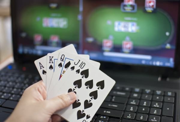 omtogel login mobile app running on Android and iOS devices showing live-dealer and sportsbook interfaces