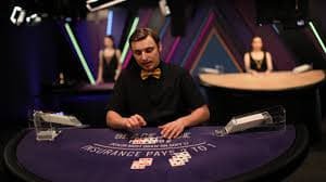Macau Pools live-dealer studio interface on omtogel login showing draw machine and number selection